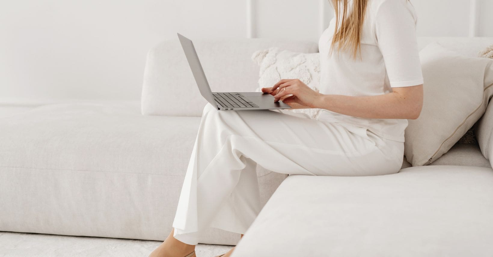 A professional woman working on her laptop.